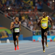 “Hey, Usain is this fast enough for you?” (AP Photo/David J. Phillip)